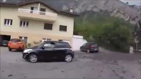 Violent mudslide smashes through Swiss village