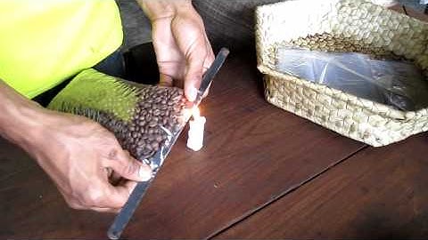 Traditional way of sealing plastic bags.MOV