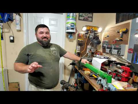 How to replace the loader hydraulic cylinder seal in the John Deere 4044m…400e 2021 loader