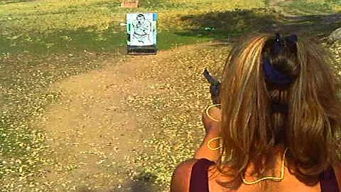 amber jean contreras shooting at a target