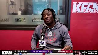 Nebraska RB Emmett Johnson with Paul Allen