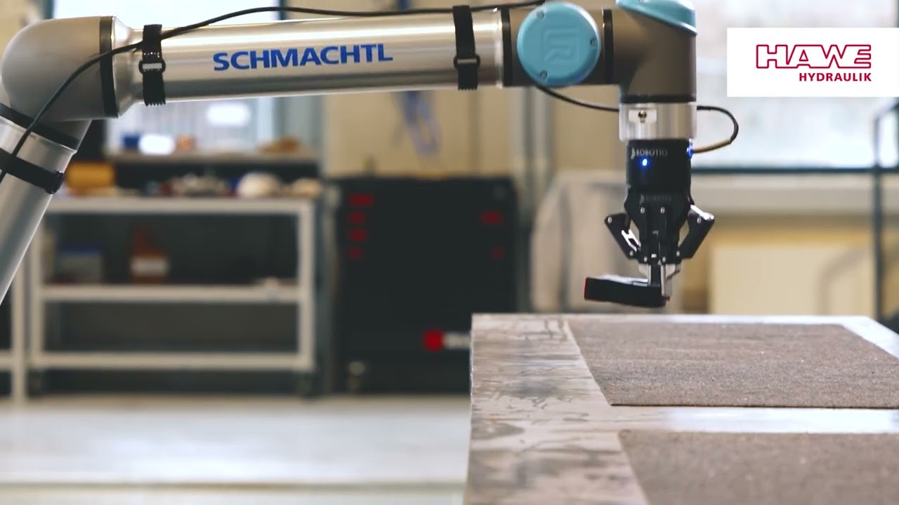 Robot platform ROVO with attached gripper arm from HAWE Mattro