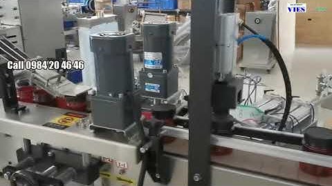 Máy cấp phối nắp và xiết vặn nắp chai miệng rộng tự động