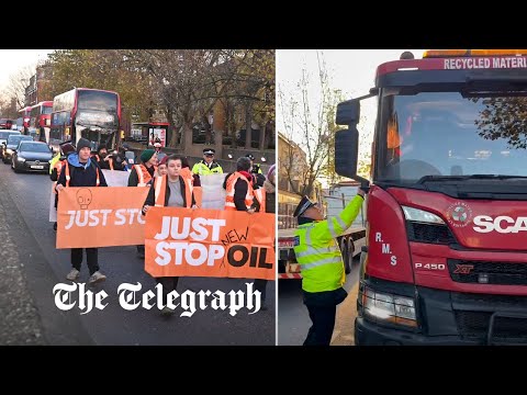 Just stop oil: angry drivers shout at police as they walk alongside activists