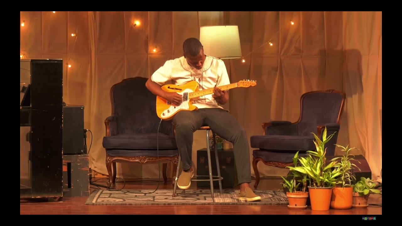 Evening Time Jamaican Mento Folk Song Performed by Guitarist Chris Campbell