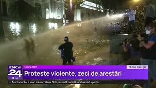 Tensiunile cresc în Georgia după protestele violente, cu 63 de arestări