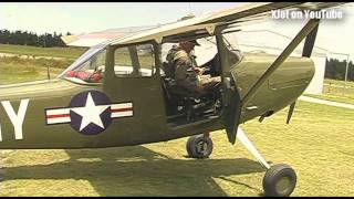A full-sized Cessna Bird Dog visits the airfield