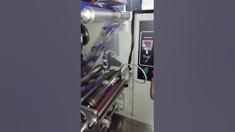 Dry ink batch coding machine on flow wrap machine