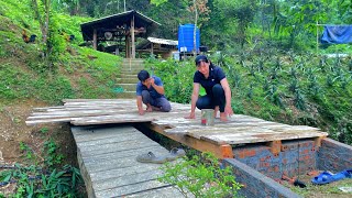 The process of building the second wooden bridge. Ensuring safety before the rainy season