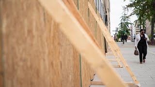 US store fronts barricade windows as fears mount over post-election violence