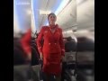 Football fans distracting the air hostess during safety announcement funny