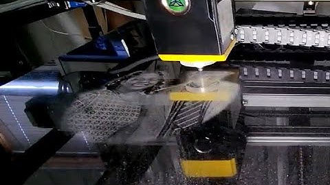 Diamond etching a portrait on a headstone