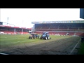 Football pitch renovation  surface removal with a koro field topmaker