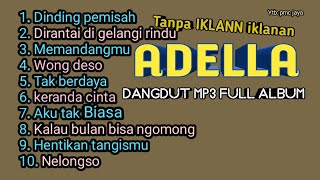 Dinding pemisah adella