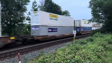 NS 4425 AC44C6M leads NS 26x through Piscataway,NJ with a BNSF GEVO trailing!