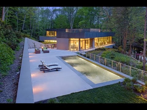 contemporary-house-design-built-on-on-a-cliff-with-unique-roof-garden