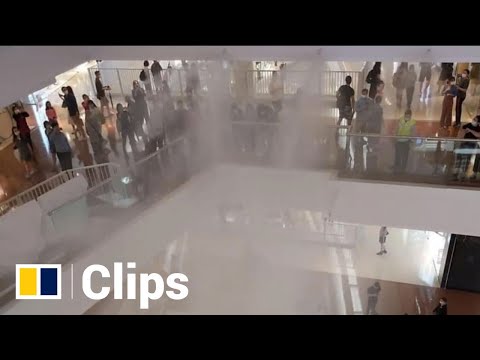 Glitzy Hong Kong shopping mall hit by indoor downpour