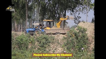 New Mahindra Earth Master  Backhoe loader  loading mud on sonalika tractor -mahindra backhoe