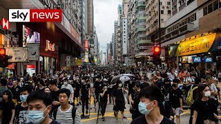 Pro-democracy protesters in hong kong have taken down a chinese
national flag and thrown it into the city's harbour their latest show
of defiance. tens of...