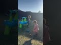 Spring time! Drix & Emy play with the water table in the backyard