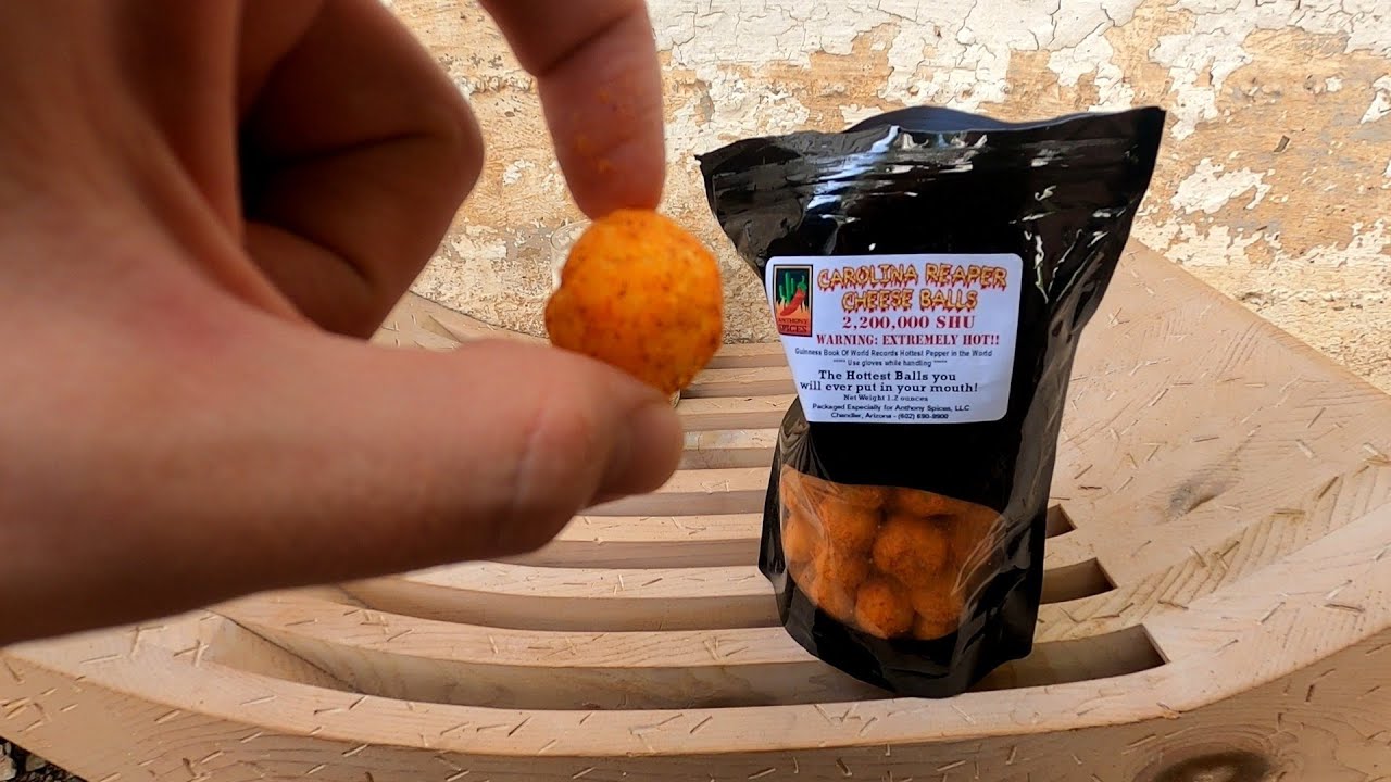 Trying the Hottest Cheese Balls in the World - YouTube
