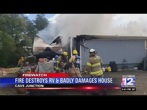 RV fire spreads to mobile home south of Cave Junction