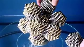 Constructing An Icosahedron Cluster | 7700 Neodymium Magnetic Balls
Constructing a cluster of 12 icosahedrons surrounding a smaller icosahedron core, made of 5mm neodymium magnetic spheres. The outer icosahedrons are seamless and made with two layers. The golden inner one had to made from 2 layers of 20 separate triangles to fit exactly. This shape is related to and inspired by the Quasicrystal Cluster Complex of HYPRKLSTRKMPLX.
Music track is High Roller by The Crystal Method.
#ledwatchman #Neocube #Neoballs #Nanodots #ZenMagnets #Speks #Buckyballs #NingoBalls #CyberCube #KlikyBalls #NeoQube Constructing An Icosahedron Cluster | 7700 Neodymium Magnetic Balls