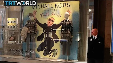 How much did Michael Kors buy Versace for?