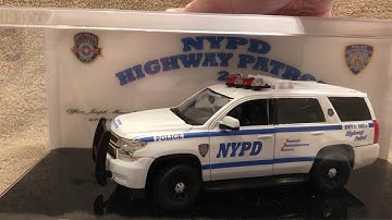 1/24 scale NYPD HWY Patrol Chevy Tahoe Diecast model with working lights and siren in display case