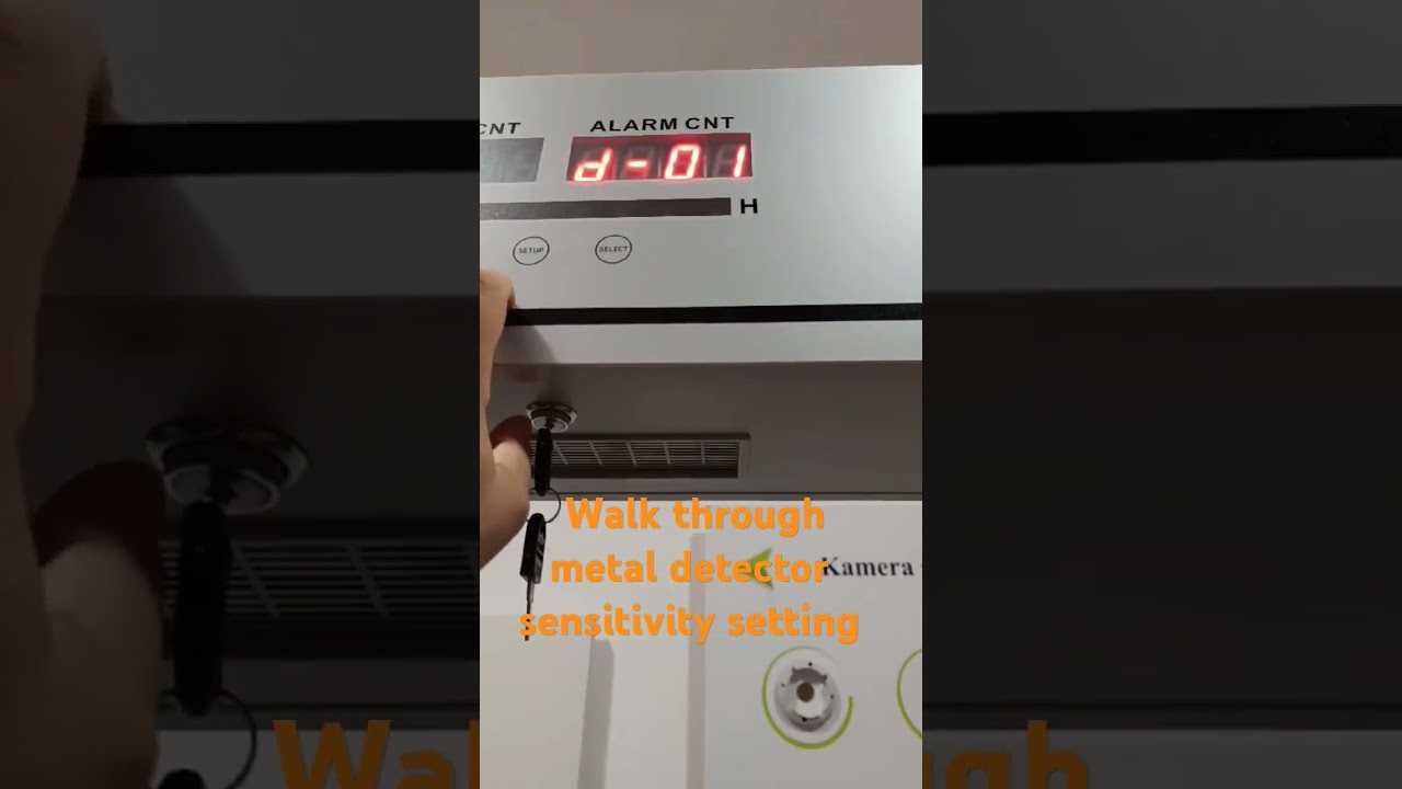 Walk through metal detector sensitivity setting