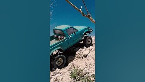 Toyota tiny truck taking on the rocks with suspension upgrades and lots of mods! RC4WD TF2 #shorts
