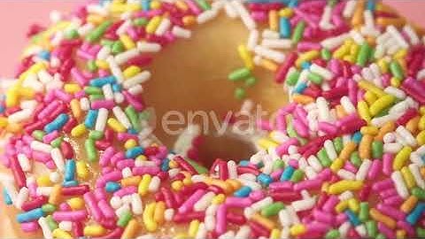 Close Up of Fresh Baked Donuts on Pink | Stock Footage - Envato elements