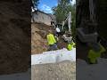 How to build a Redi Rock Wall and Gravity Wall with excavator #construction #gravitywall #e60
