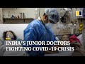 Junior doctors making life and death choices in India as Covid-19 ravages the country