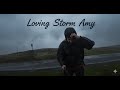 UK Storm chaser and VanLife storm Amy-  frilling hike up a hill to feel the power of nature