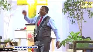 PASTOR NGANGA DANCING IN CHURCH.