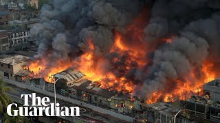 'It's all over': huge fire rips through Dhaka clothing market