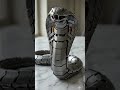 This looks harmless until you press the button... 🐍#satisfying #transformers #3dart #animation