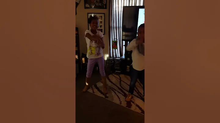 Two little girls dancing