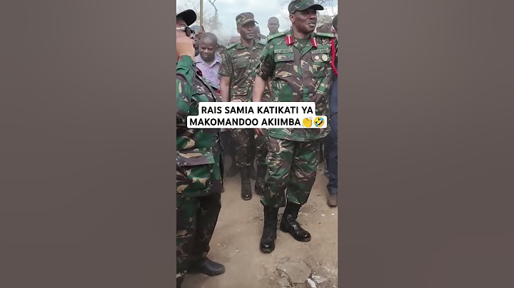 RAIS SAMIA KATIKATI YA MAKOMANDO AKIIMBA