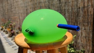 A Nerf Dart hits a balloon in superslow motion 960FPS