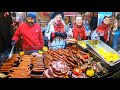 Street food in bucharest romania grilled meat pork shanks giant sausages