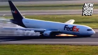 WATCH: Boeing cargo plane makes emergency 'belly' landing after landing gear fails