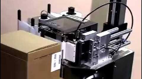 Weber 2600 Label Printer Applicator applying labels around corner of box