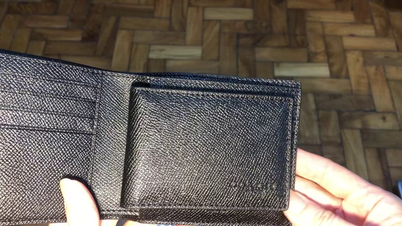 Coach Men's wallet has serial number 