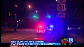 Man handcuffed escapes police cruiser