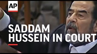 Saddam Hussein in court, turbulent scenes continue