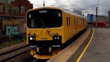Class 950 passes Manors Train Station