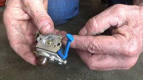 Cleaning carburetor on a string trimmer