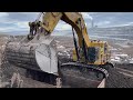 Huge caterpillar 6015b excavator loading mercedes  man trucks  sotiriadis mining works